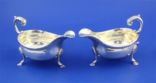 A pair of early George III silver sauceboats by George Smith II, 20 oz.